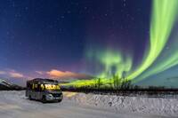 Motorhome in the Southern Arctic Circle beneath the Aurora