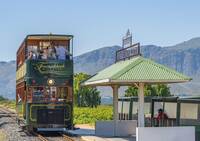 Franschhoek wine tram arriving at Rickety Bridge Wine Estate