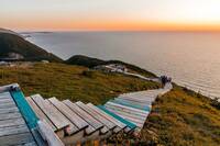 Cabot Trail - steps down hillside towards sea as sun sets