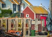 Peggy's Cove harbour with fishman huts and lobster nets